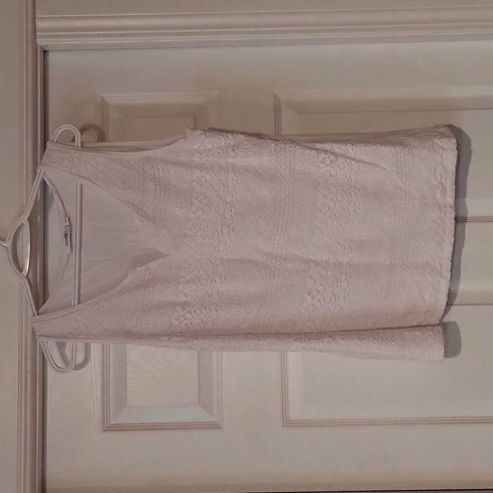 Ricki's white tank top